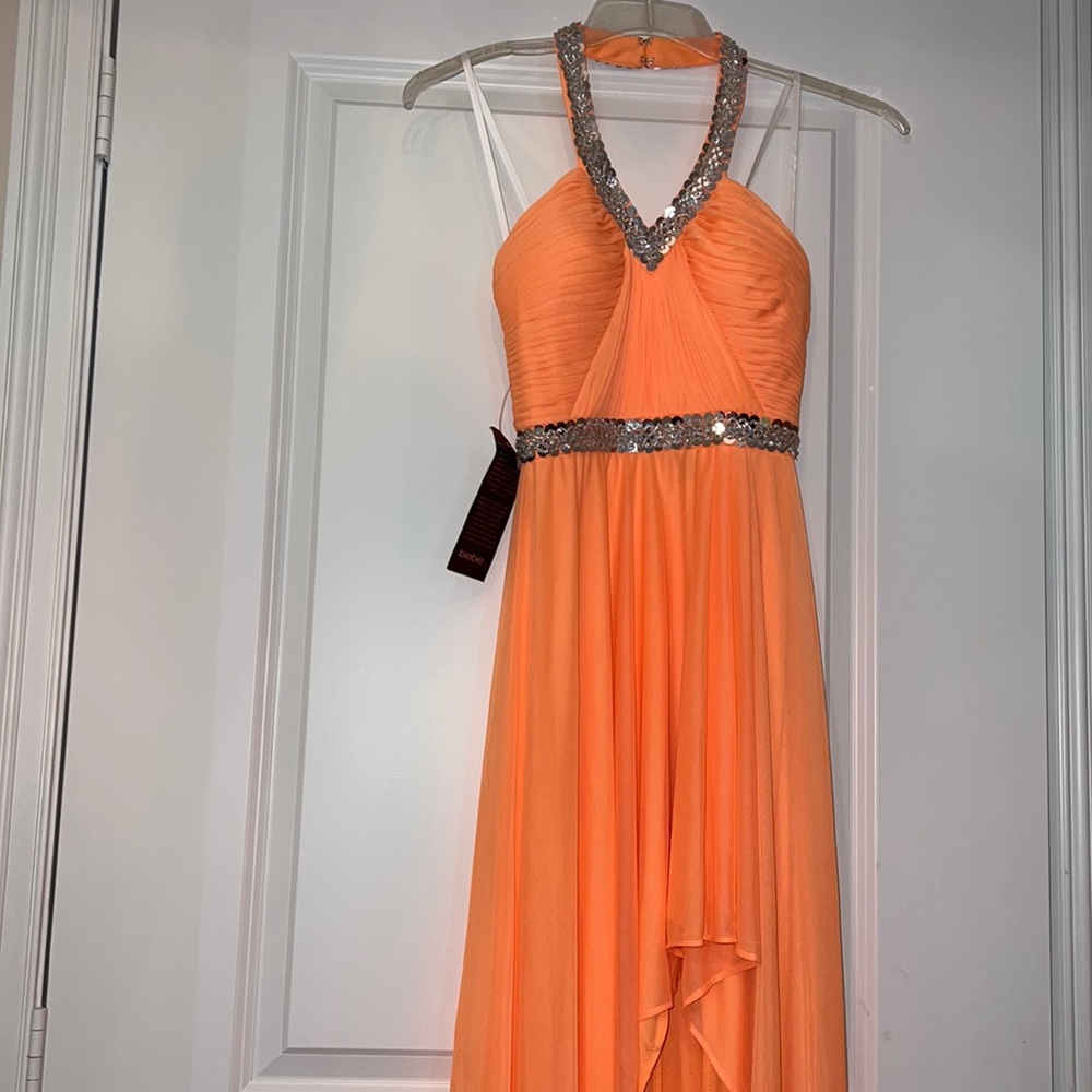 Pageant style Bebe dress NWT.  Size 0.  Beautiful and great for prom, gala, etc